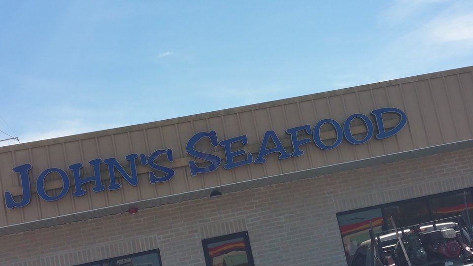 Front counter at a seafood and fried chicken spot.