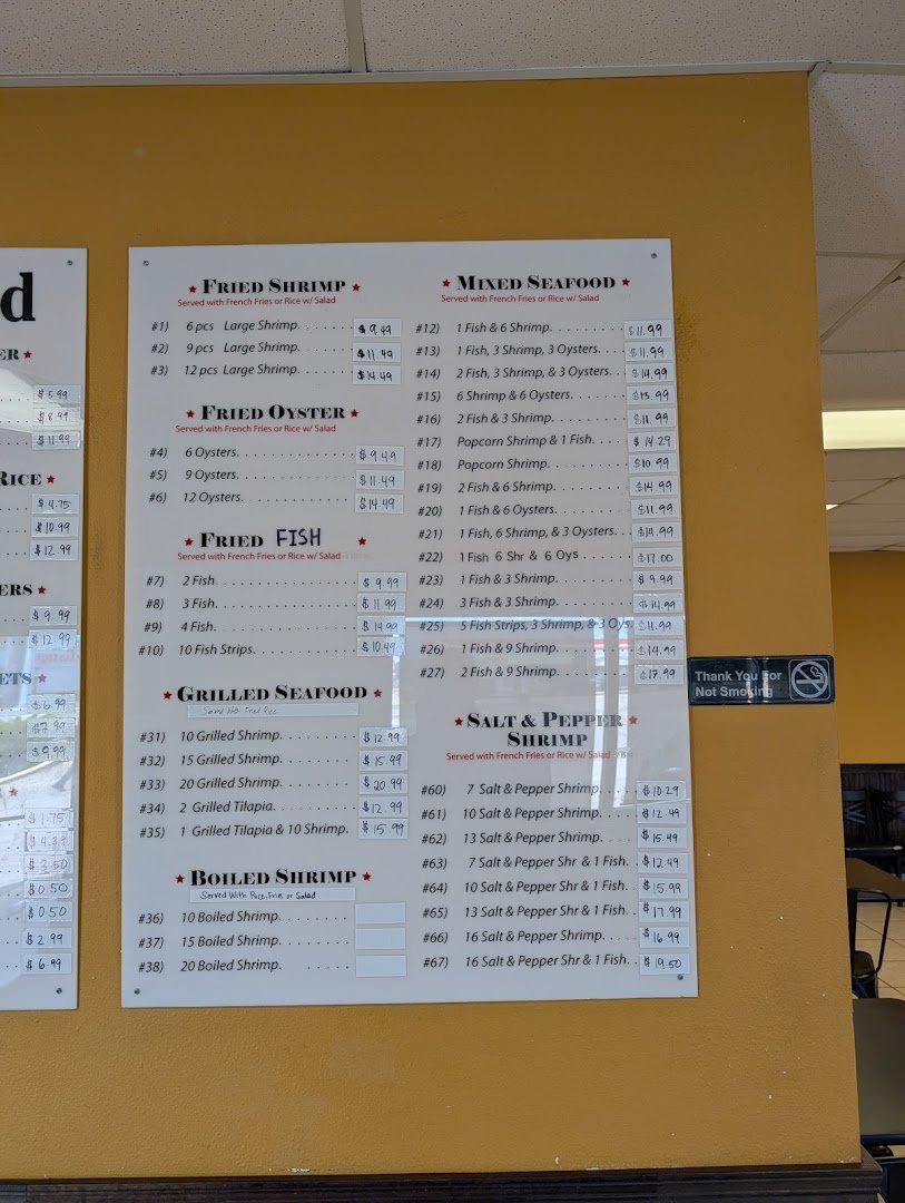 Plain counter service inside a seafood restaurant.
